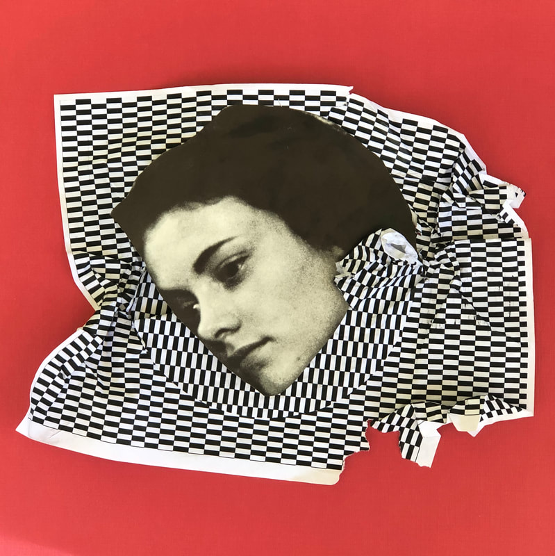 We see just the face of a dark-haired woman surrounded by a piece of black-and-white geometrically-patterned fabric. Behind it, a red backdrop.