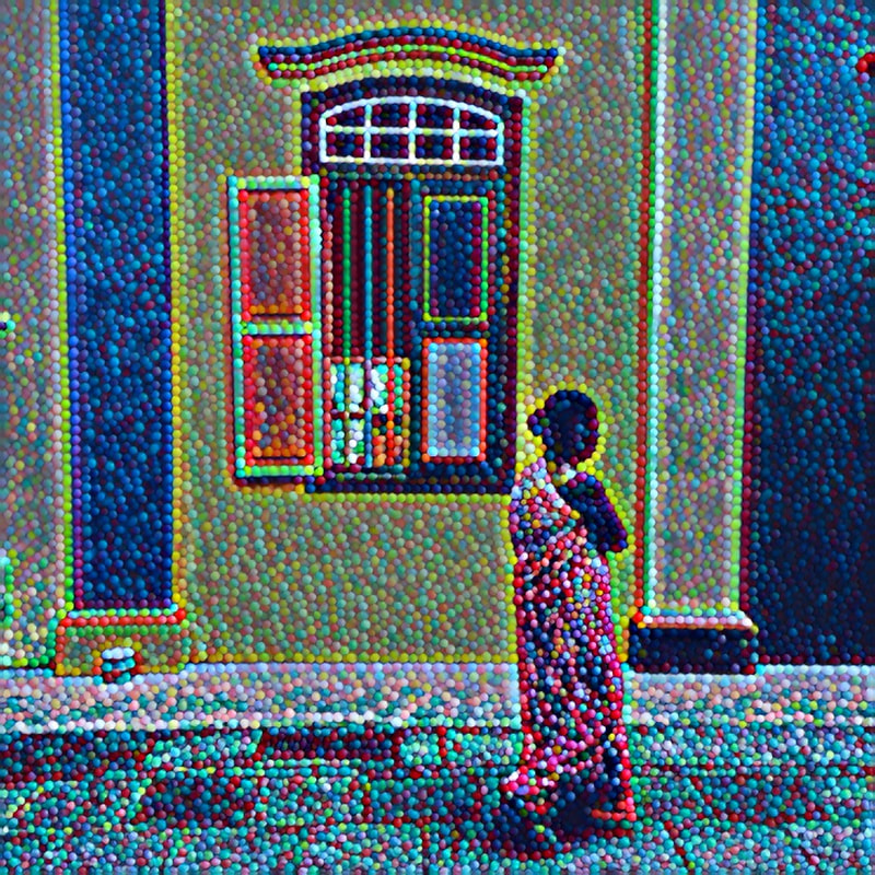 Woman wearing a sari walking away from viewer