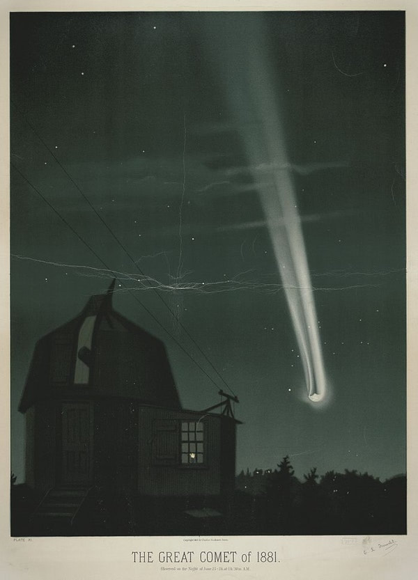 Meteor falling through a dark sky beside an observation station and electric lines. 