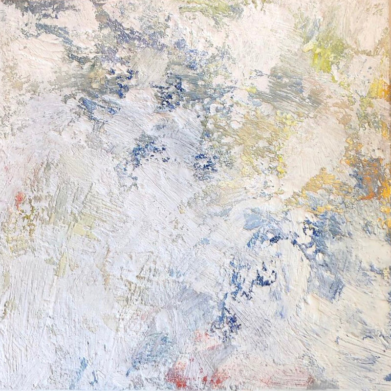 encaustic painting. Brushstrokes of white with under layers of dark blue, orange and red.