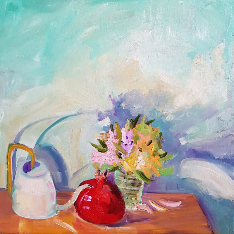 Still life of table with watering can, vase of flowers