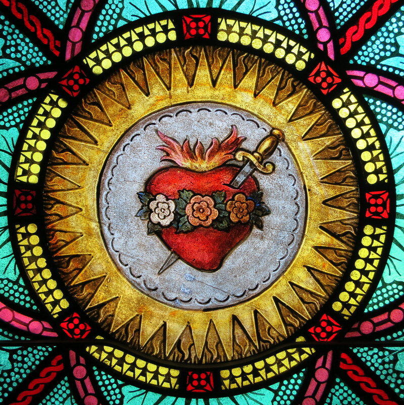Stained glass image of pierced heart