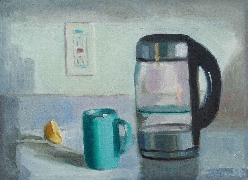 Still life, blue counter, wall, pitcher of water, blue coffee cup and half slice of lemon on counter.